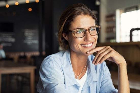 Woman smiling and confident with her smile