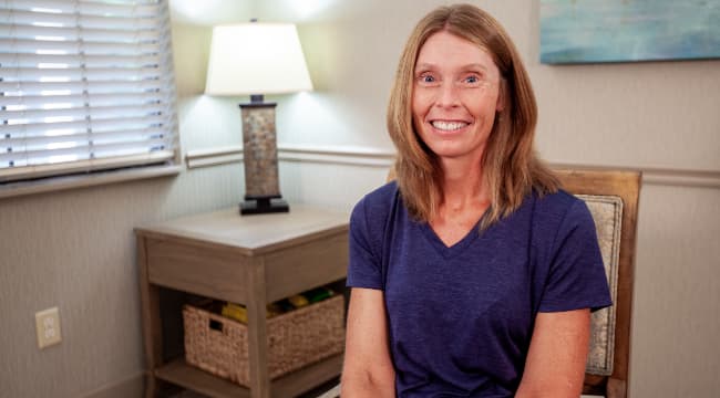 Susan talking about her dental experiences at Farnham Dentistry.